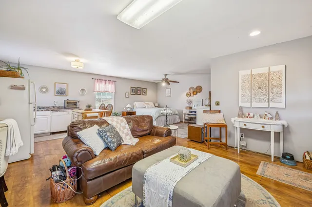a view of a balcony with wooden floor