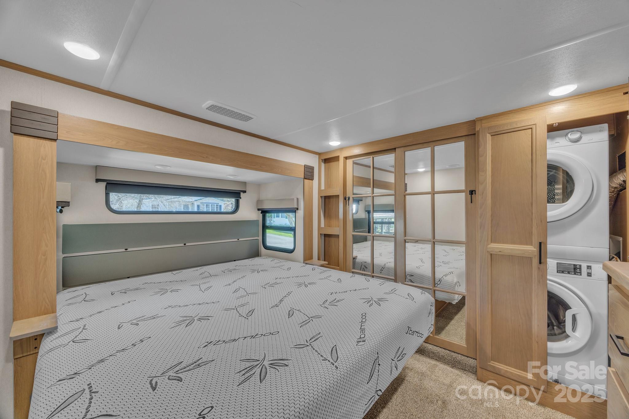 195 Finch Way, Unit 7 West Jefferson, NC 28694 - Photo 24 of 39 a bedroom with a large bed and a window