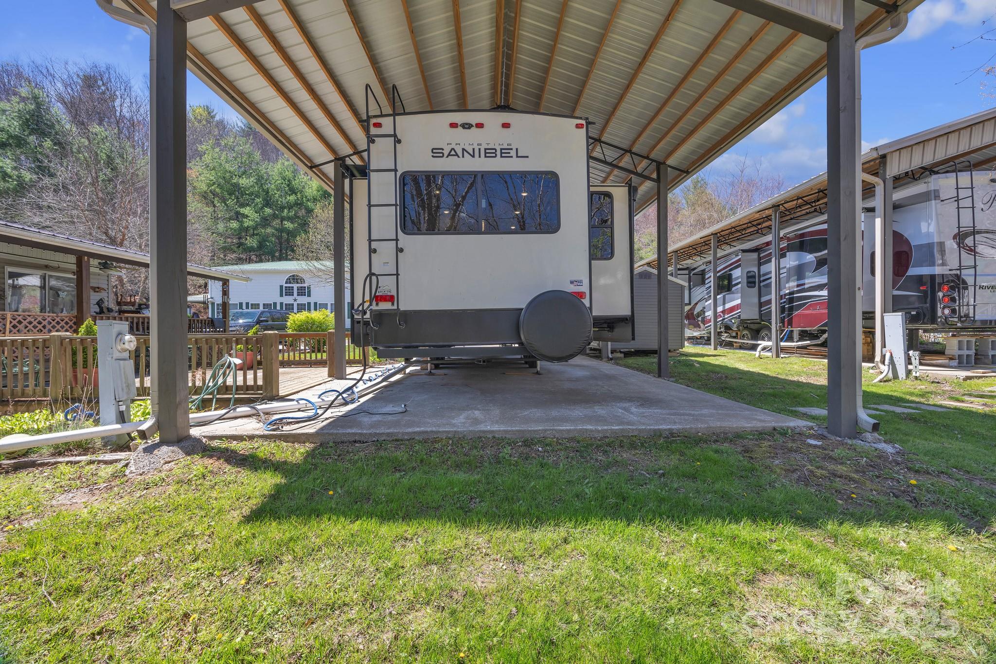 195 Finch Way, Unit 7 West Jefferson, NC 28694 - Photo 33 of 39 a front view of a house with a yard