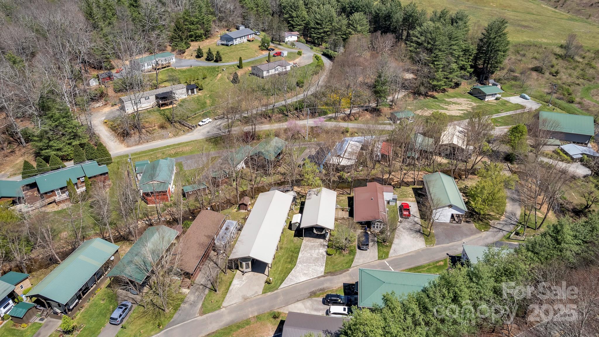 195 Finch Way, Unit 7 West Jefferson, NC 28694 - Photo 37 of 39 an aerial view of residential houses with outdoor space