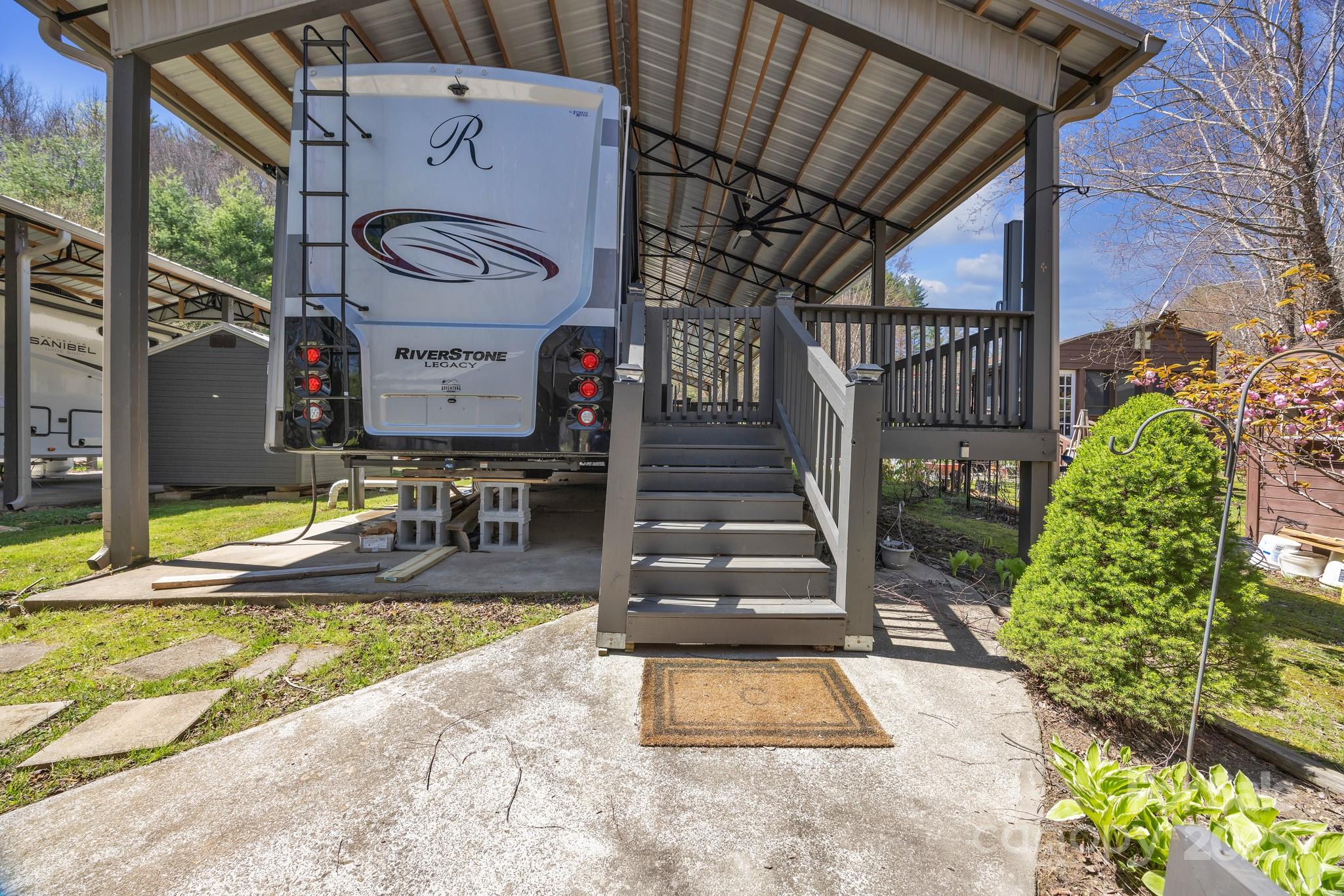 195 Finch Way, Unit 7 West Jefferson, NC 28694 - Photo 4 of 39 a view of swimming pool with a yard