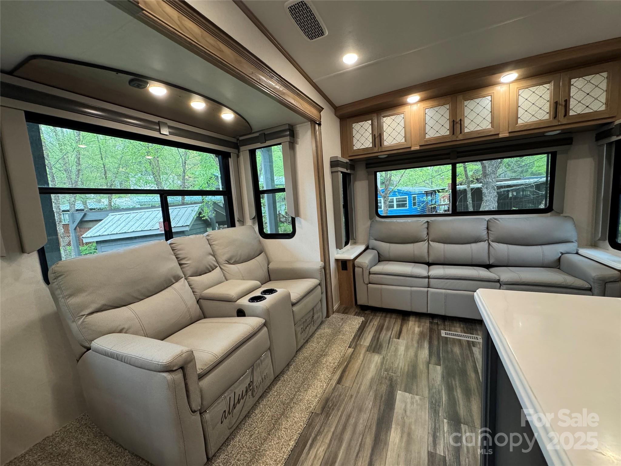 195 Finch Way, Unit 7 West Jefferson, NC 28694 - Photo 7 of 39 a living room with furniture and a large window