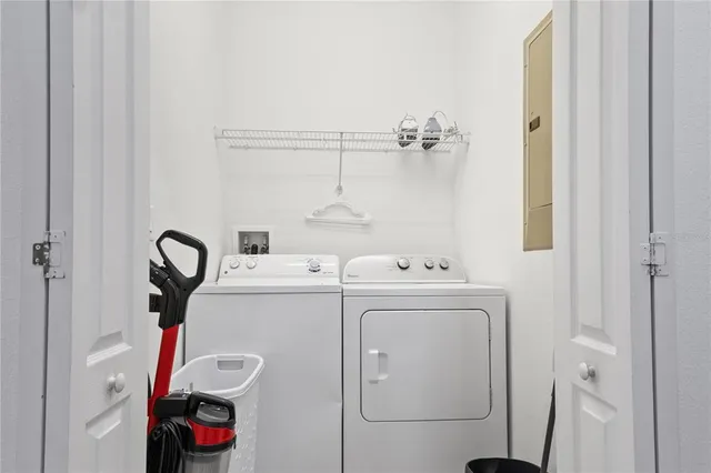a utility room with dryer and washer
