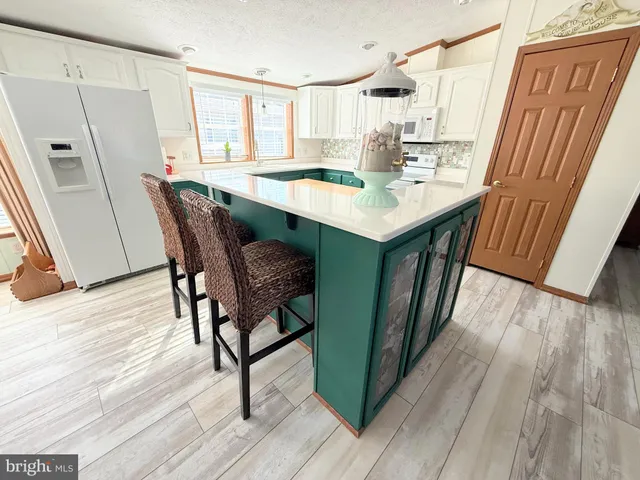 a room with window and wooden floors