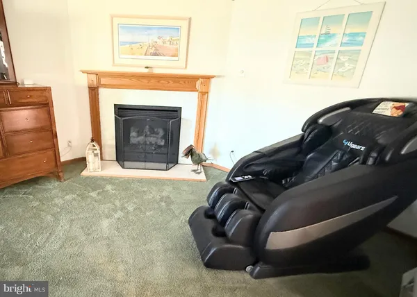 a bathroom with a sink a mirror and a shower curtain
