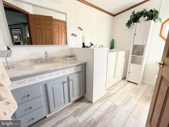 a bathroom with a bathtub and shower