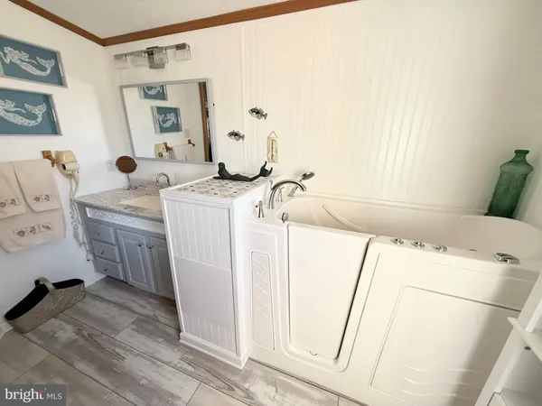 a bathroom with a toilet and a sink