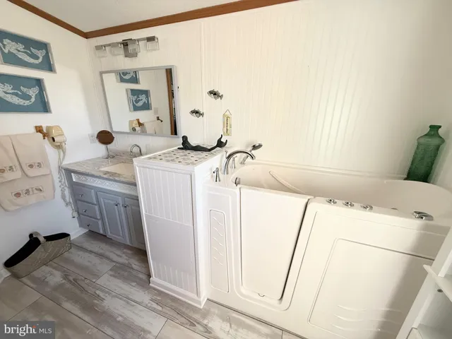 a bathroom with a toilet and a sink