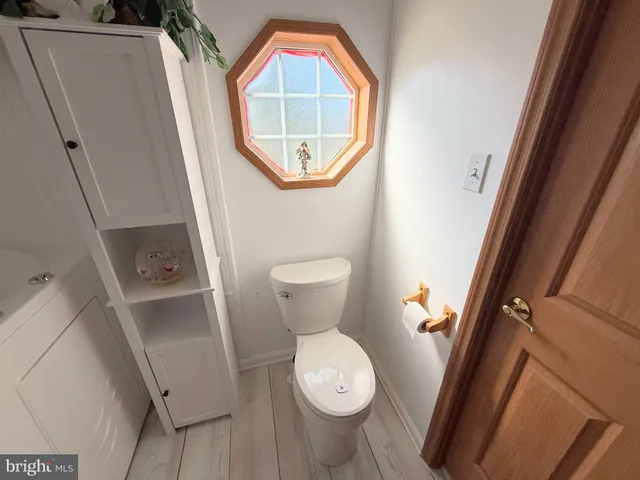 a view of balcony with furniture