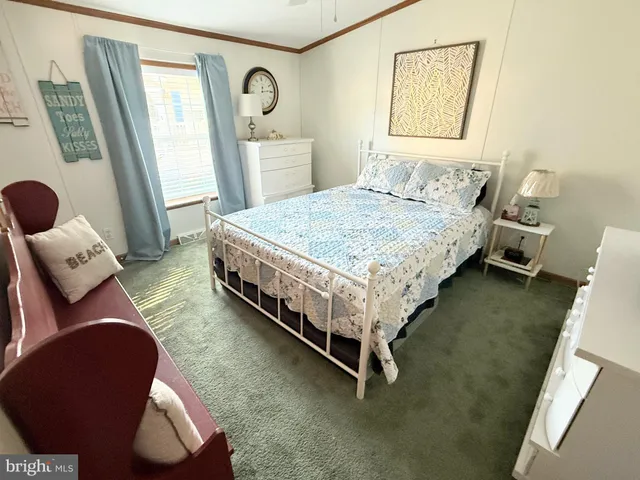 a bathroom with a granite countertop sink and vanity