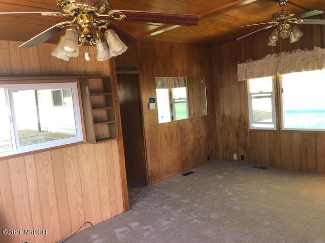 1095 West McCoy Lane, Unit 16 Santa Maria, CA 93455 - Photo 5 of 16 a view of an empty room with a window