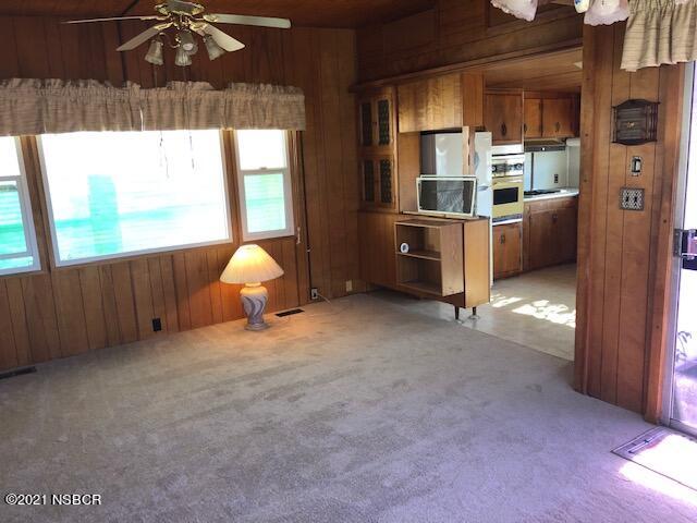 1095 West McCoy Lane, Unit 16 Santa Maria, CA 93455 - Photo 6 of 16 a view of an empty room with a window