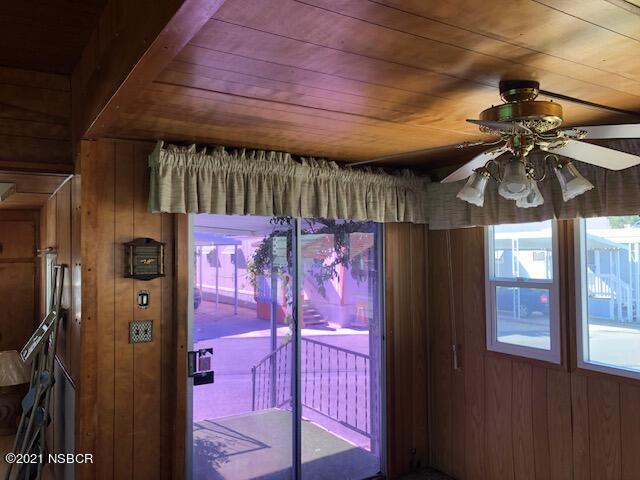 1095 West McCoy Lane, Unit 16 Santa Maria, CA 93455 - Photo 9 of 16 a room with window and a chandelier