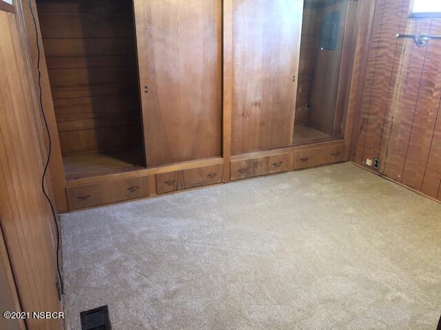 1095 West McCoy Lane, Unit 16 Santa Maria, CA 93455 - Photo 10 of 16 a view of an empty room with a glass door