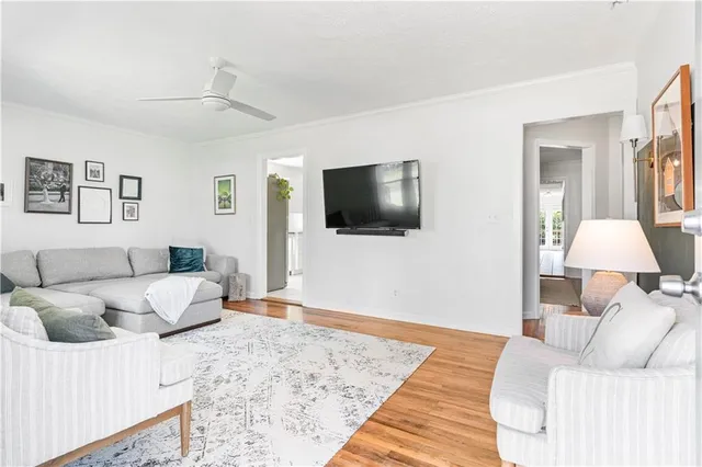 a living room with a couch and a flat screen tv