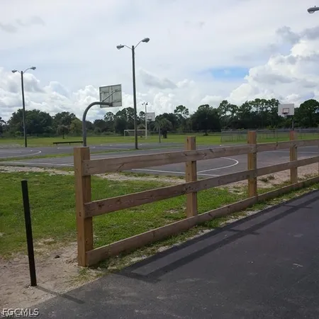 a sign broad on the side of the road