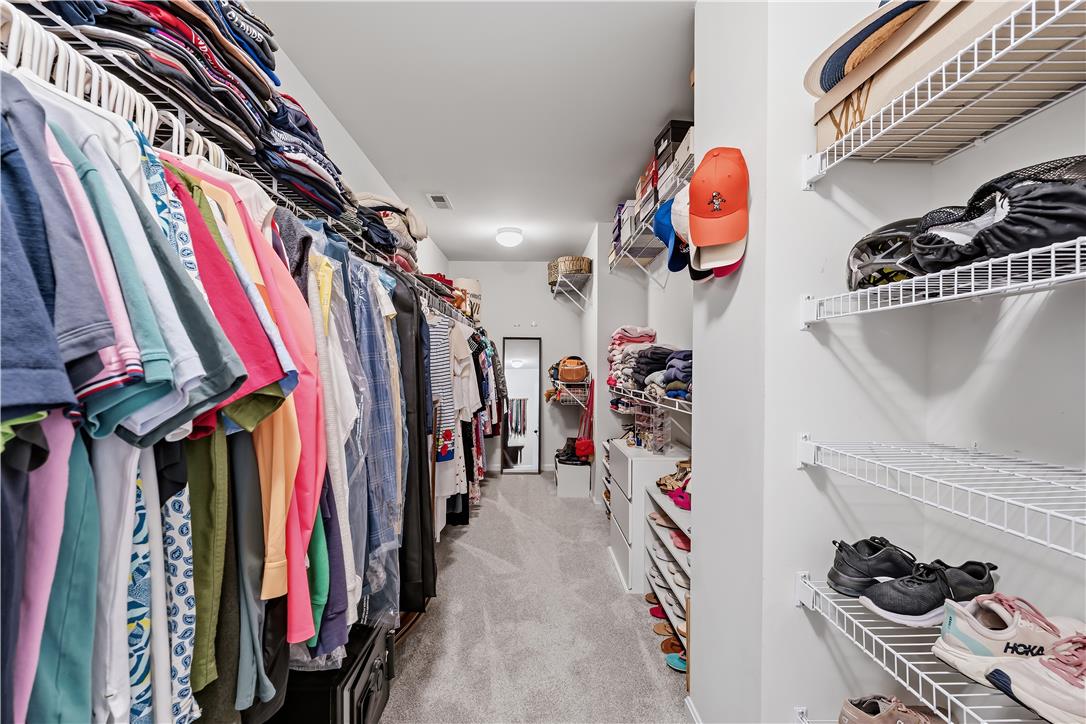 9031 Pathfinder Road Breinigsville, PA 18031 - Photo 37 of 63 Ample storage solutions abound in this well-organized walk-in closet, perfect for any wardrobe.