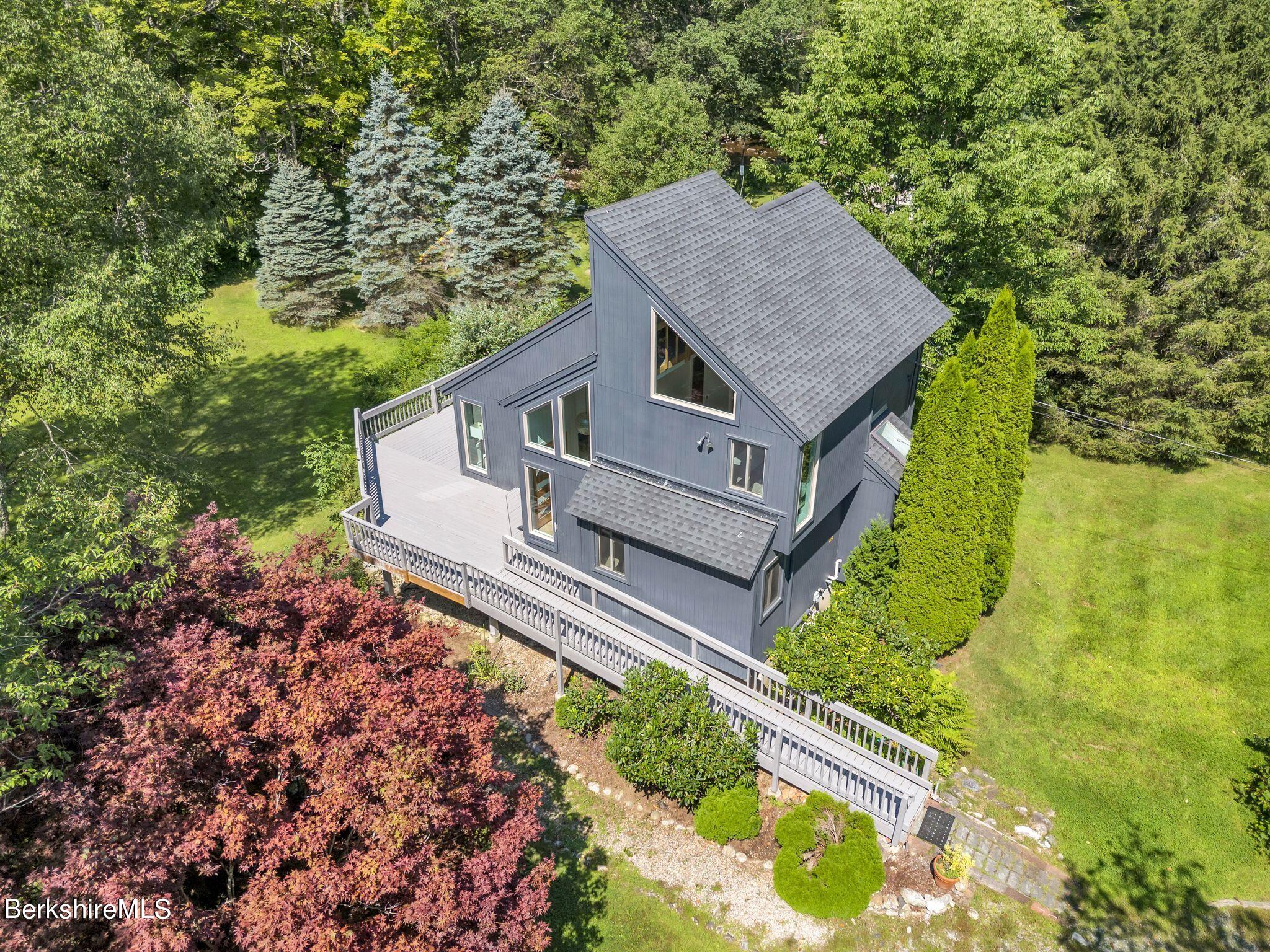 21 Sandisfield Road Sandisfield, MA 01255 - Photo 55 of 65 a aerial view of a house with a yard