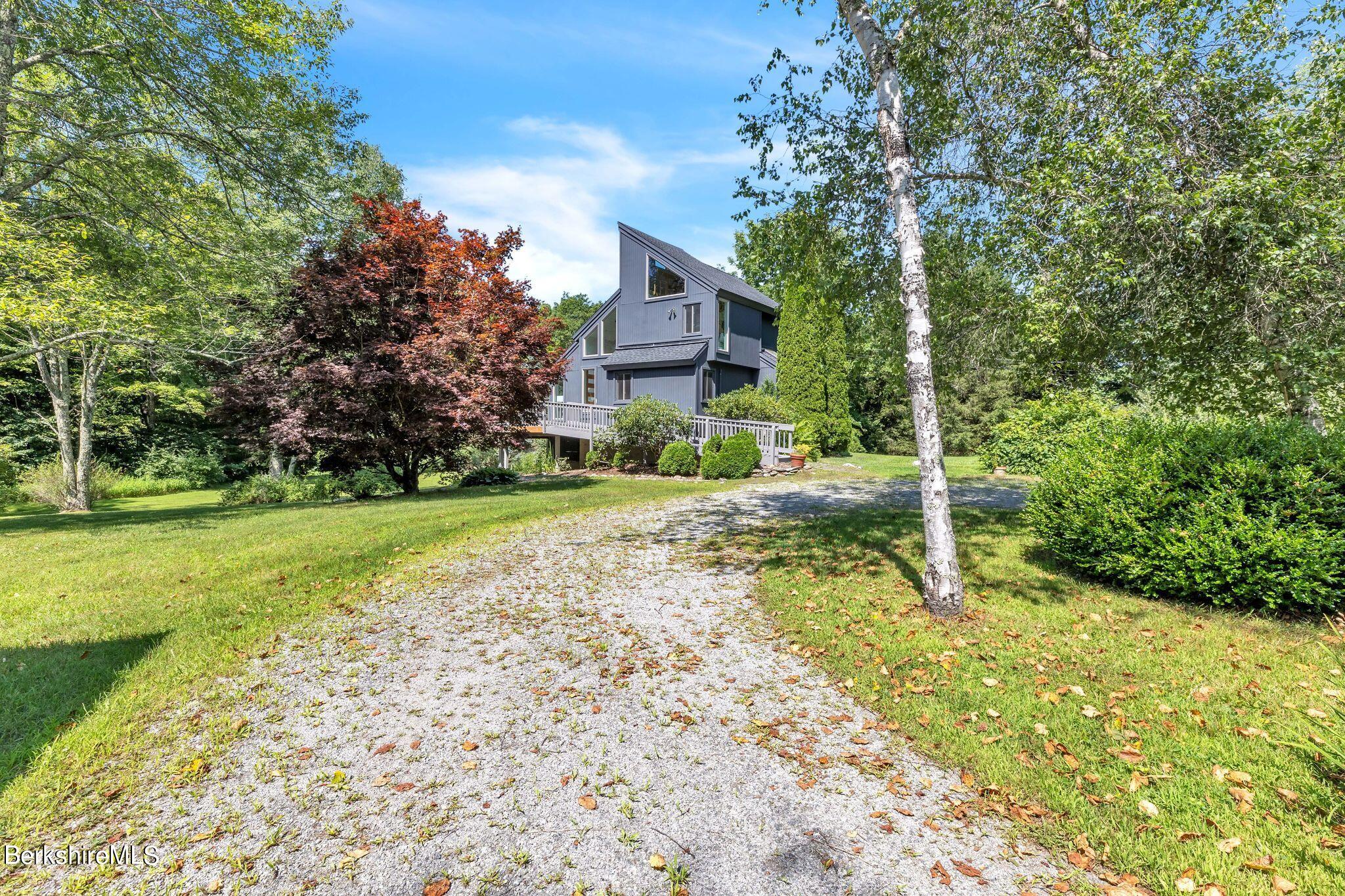 21 Sandisfield Road Sandisfield, MA 01255 - Photo 64 of 65 a house with huge green field in front of it