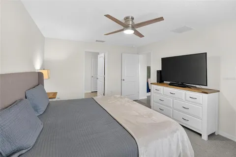 a bathroom with double sink and a mirror