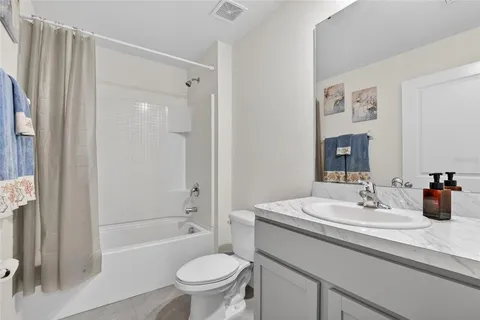 a workspace with furniture and a window