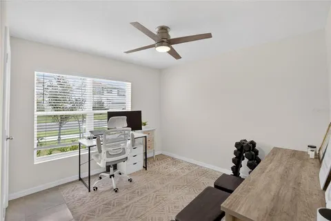 a room with furniture and a window