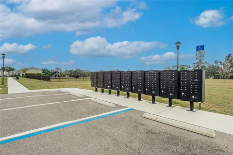 a picture of a bench in front of a wall