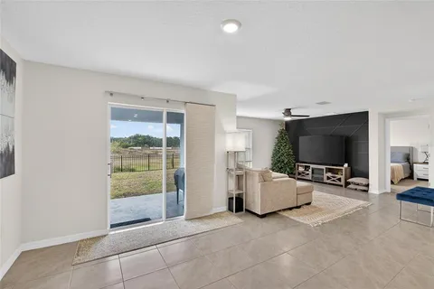 a kitchen with stainless steel appliances a refrigerator and a stove top oven