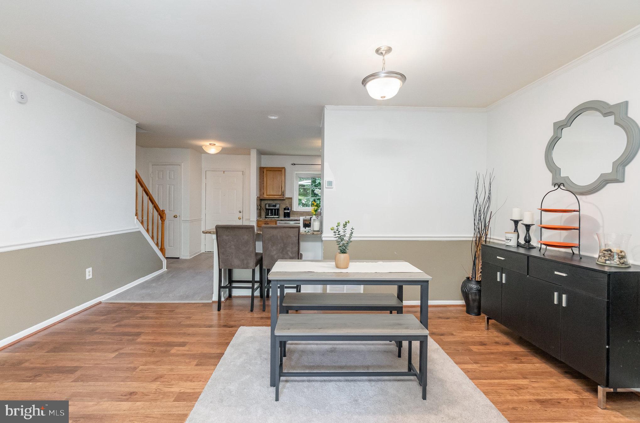 22 Bryce Court Baltimore, MD 21236 - Photo 12 of 28 a room with furniture and wooden floor