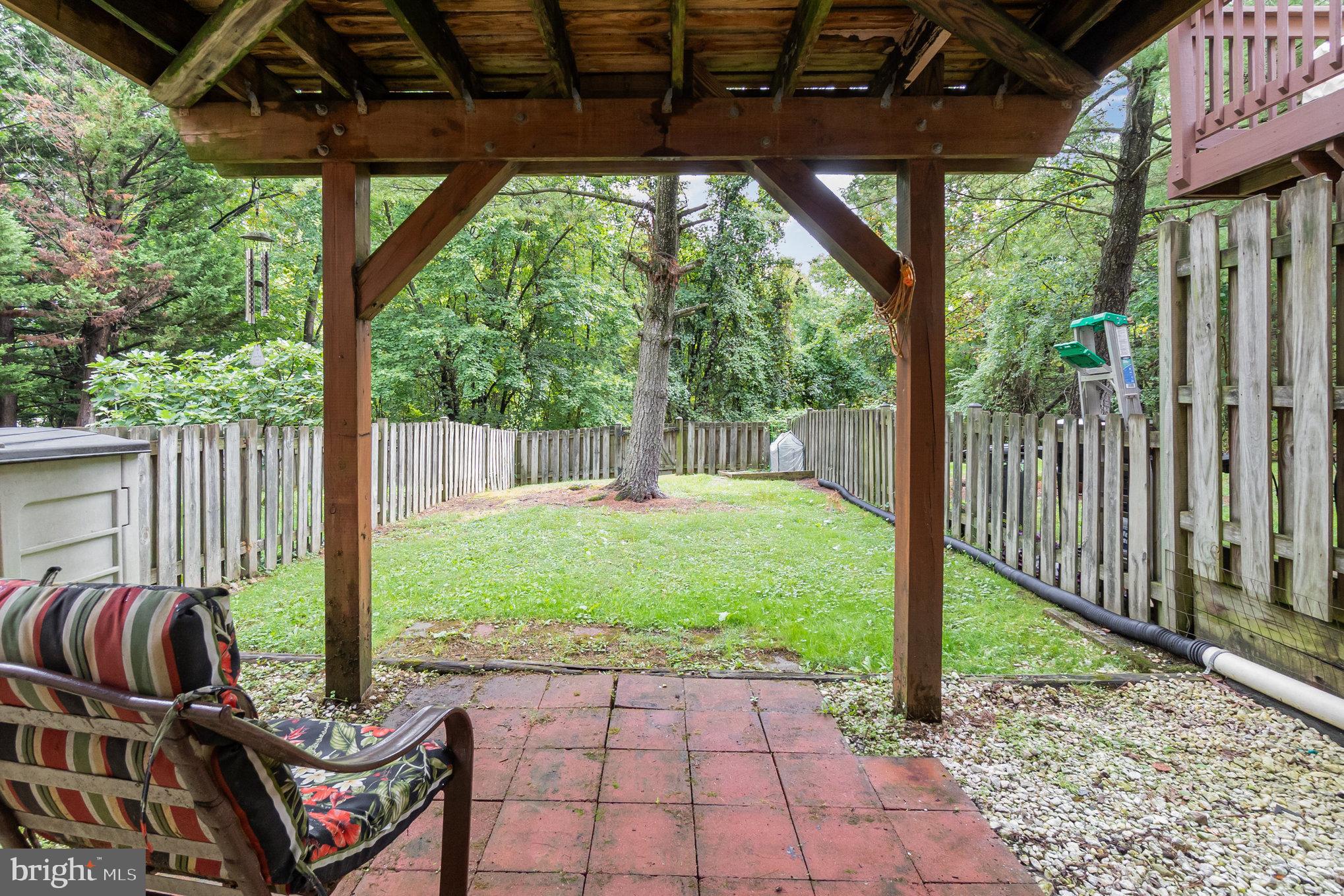 22 Bryce Court Baltimore, MD 21236 - Photo 24 of 28 a backyard of a house with seating space