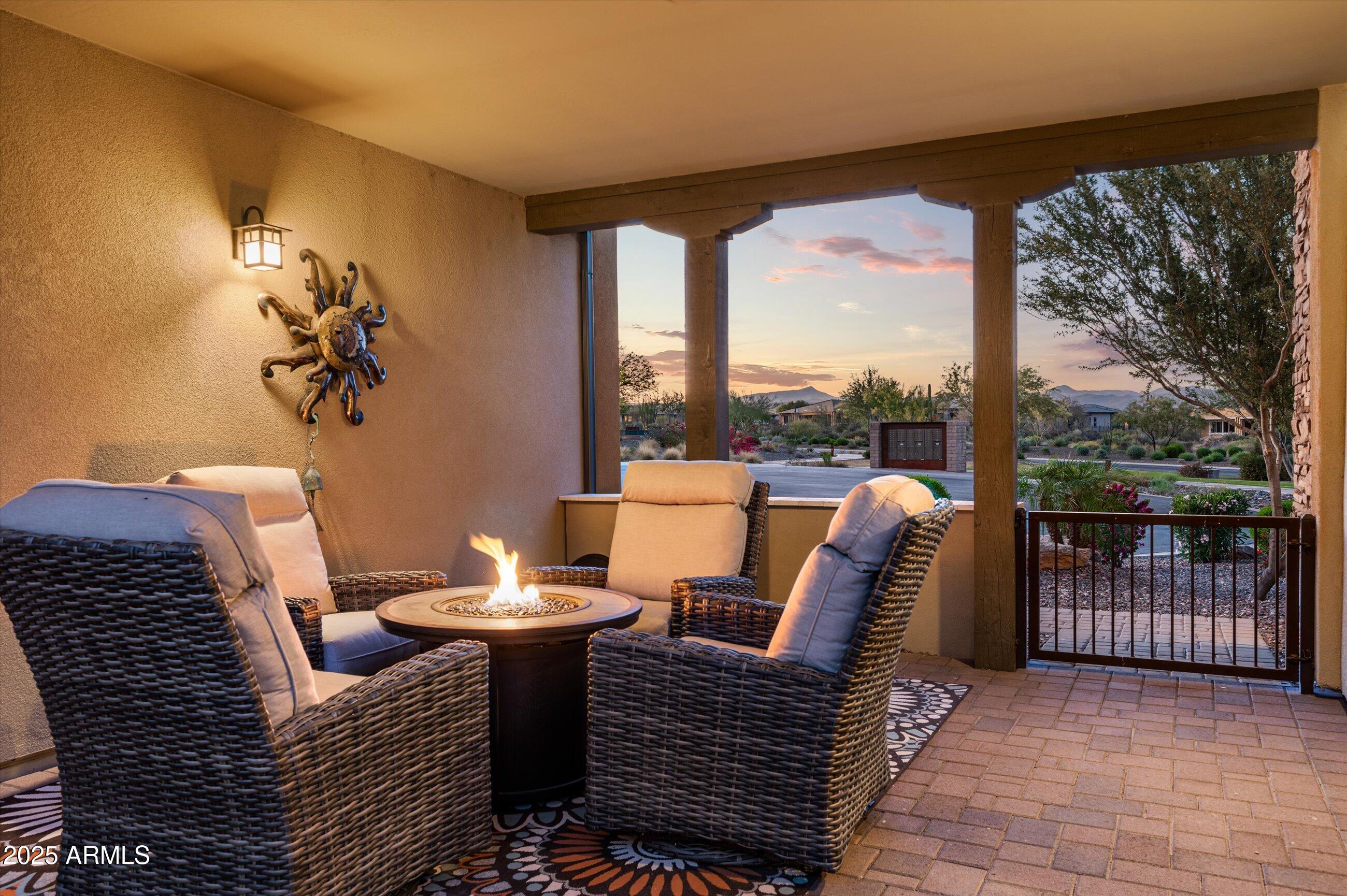17971 East Cindercone Road Rio Verde, AZ 85263 - Photo 4 of 58 a view of a balcony with couch and chairs