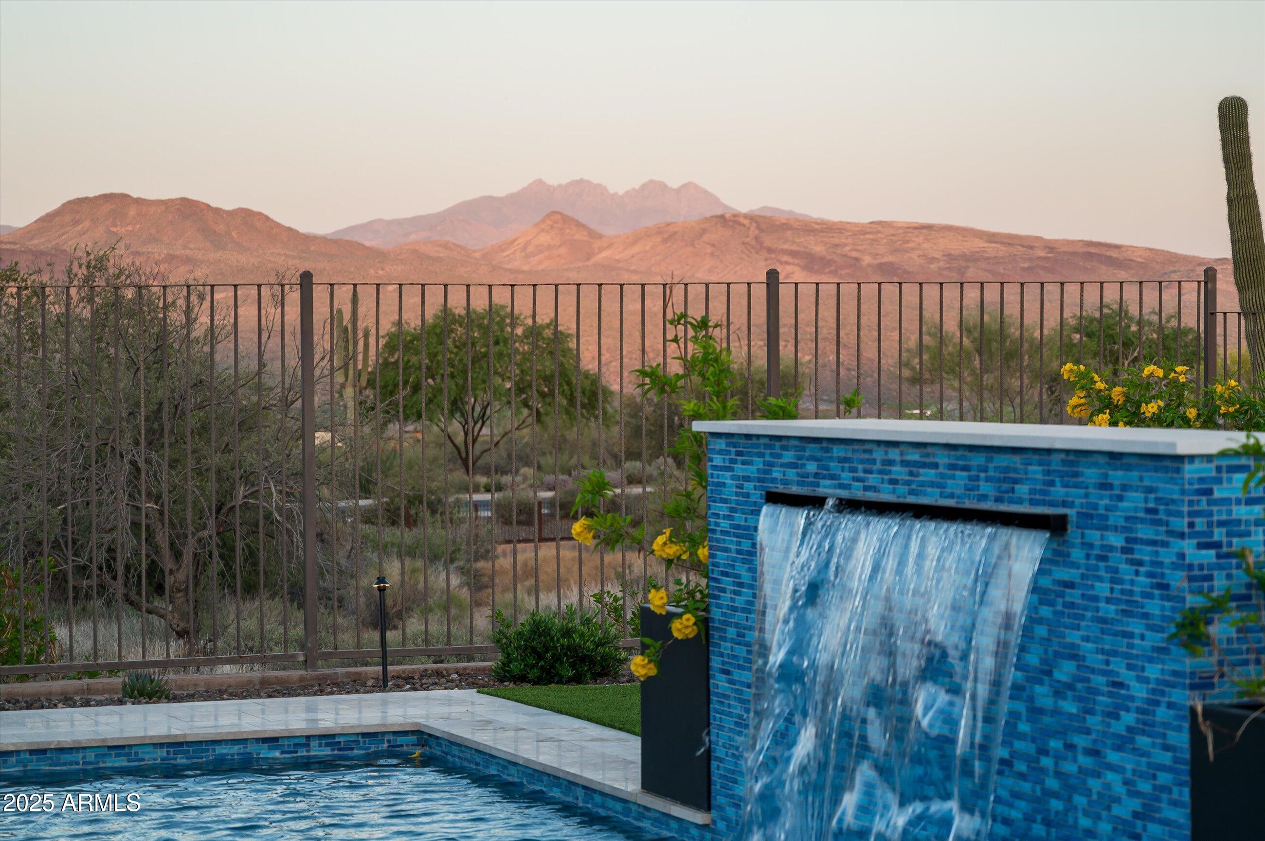 17971 East Cindercone Road Rio Verde, AZ 85263 - Photo 42 of 58 a view of a terrace with a garden