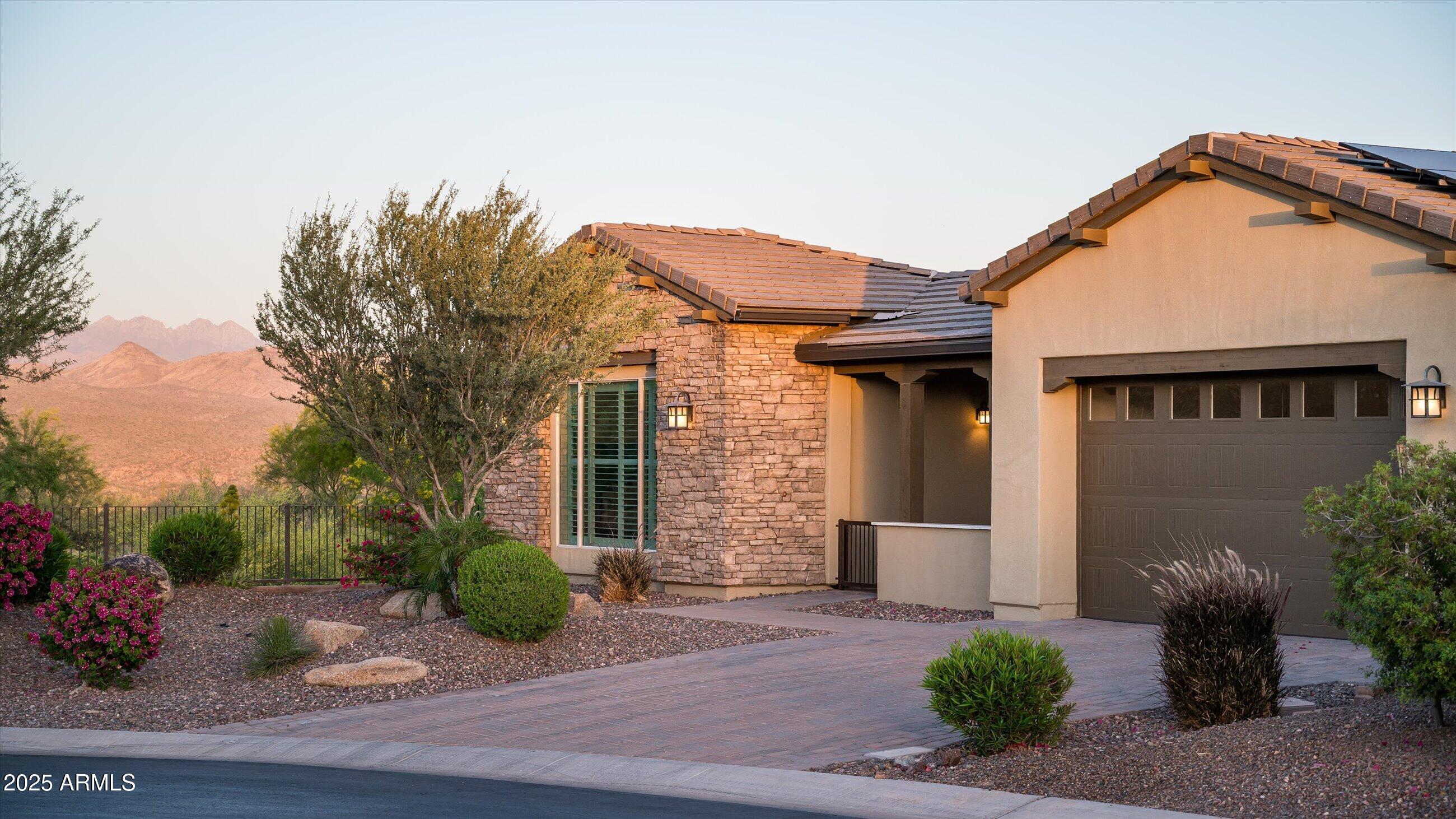 17971 East Cindercone Road Rio Verde, AZ 85263 - Photo 45 of 58 front view of a house with a yard
