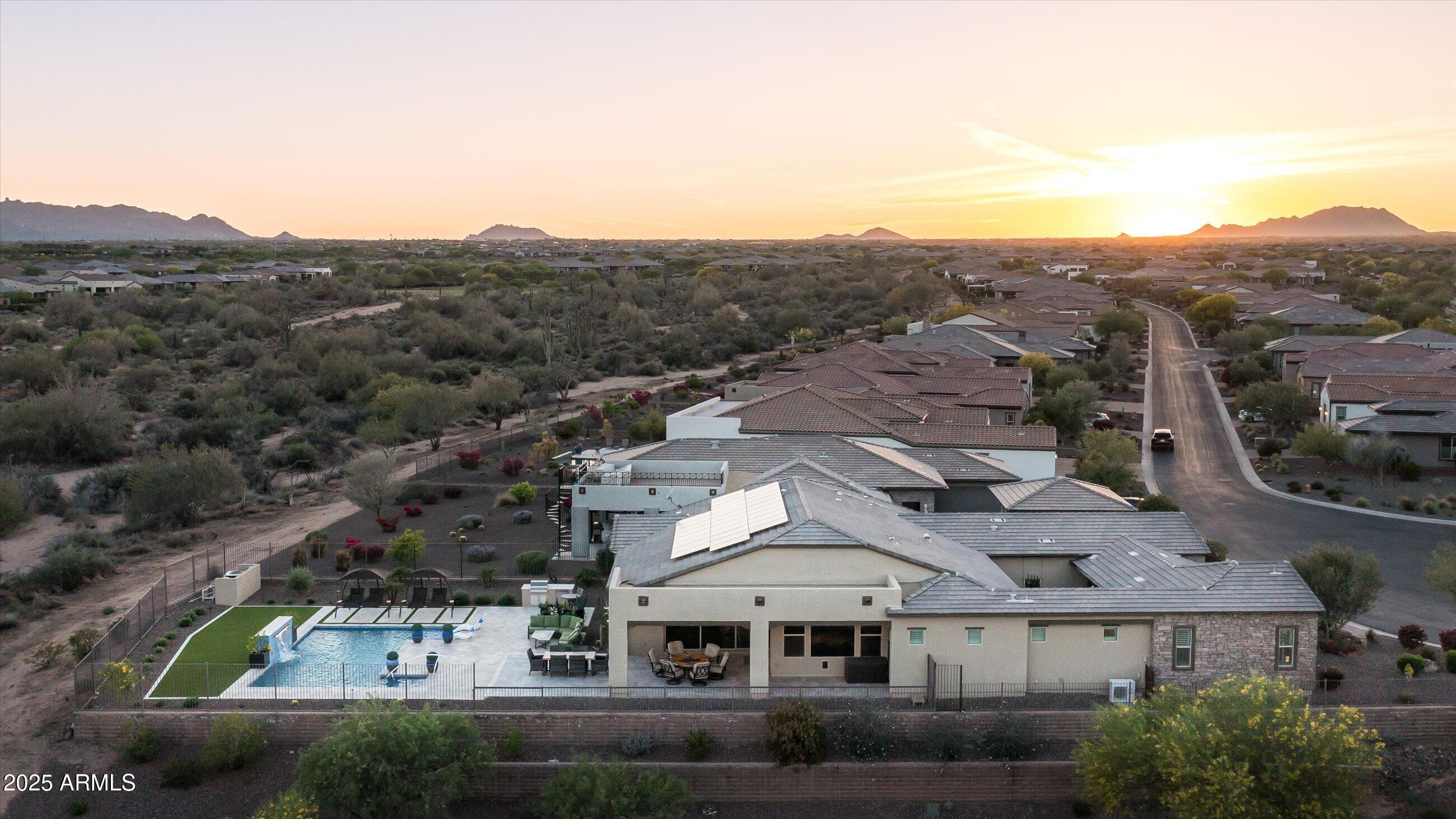 17971 East Cindercone Road Rio Verde, AZ 85263 - Photo 46 of 58 an aerial view of residential houses with outdoor space and parking