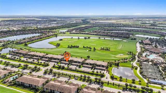 an aerial view of a building with outdoor space