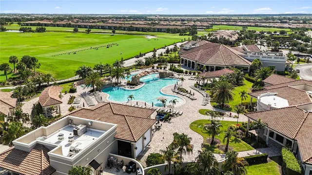 an aerial view of a house with outdoor space