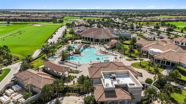 an aerial view of a house with a garden