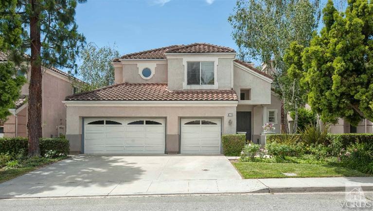 4317 Timberdale Road Moorpark, CA 93021 - Photo 4 of 26 a front view of a house with a garden