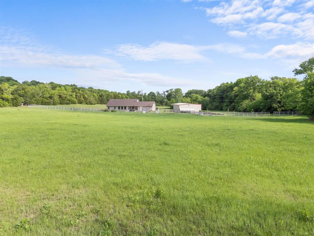 254 Jackson Road Whitewright, TX 75491 - Photo 6 of 40 Back view of home from fenced in pasture