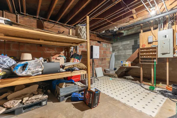 a view of room with window and wooden floor
