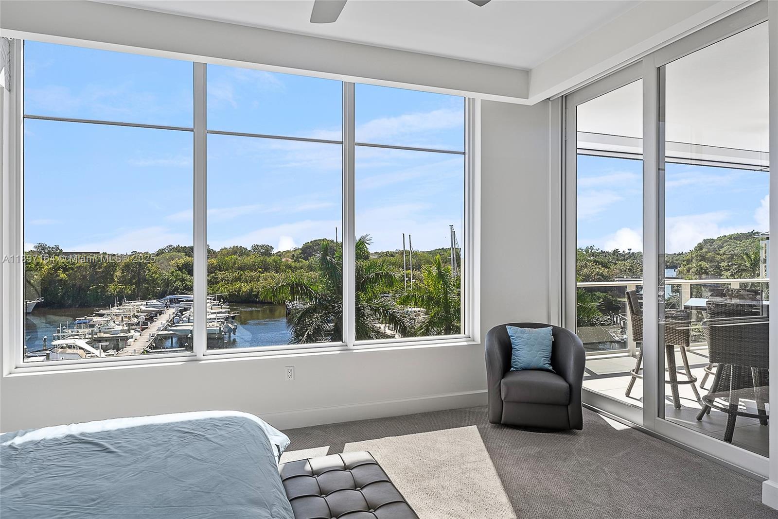 2720 Donald Ross Road, Unit 406 Palm Beach Gardens, FL 33410 - Photo 12 of 35 a living room filled with furniture and a window