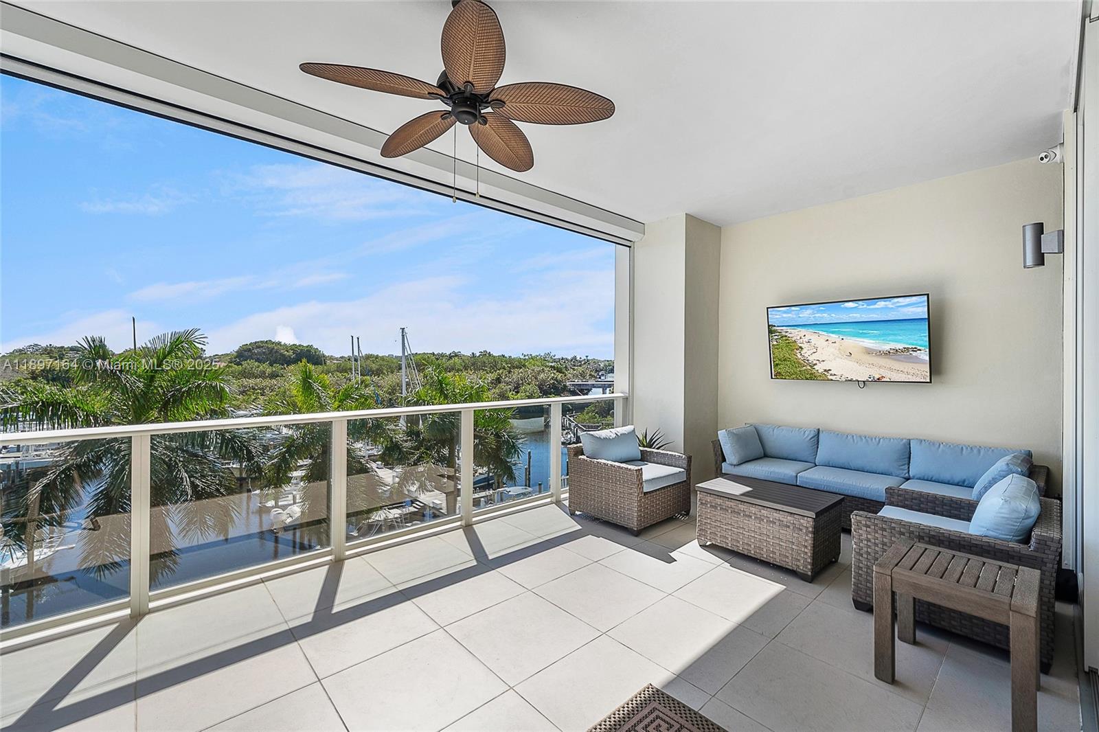 2720 Donald Ross Road, Unit 406 Palm Beach Gardens, FL 33410 - Photo 18 of 35 a view of livingroom with furniture and floor to ceiling window