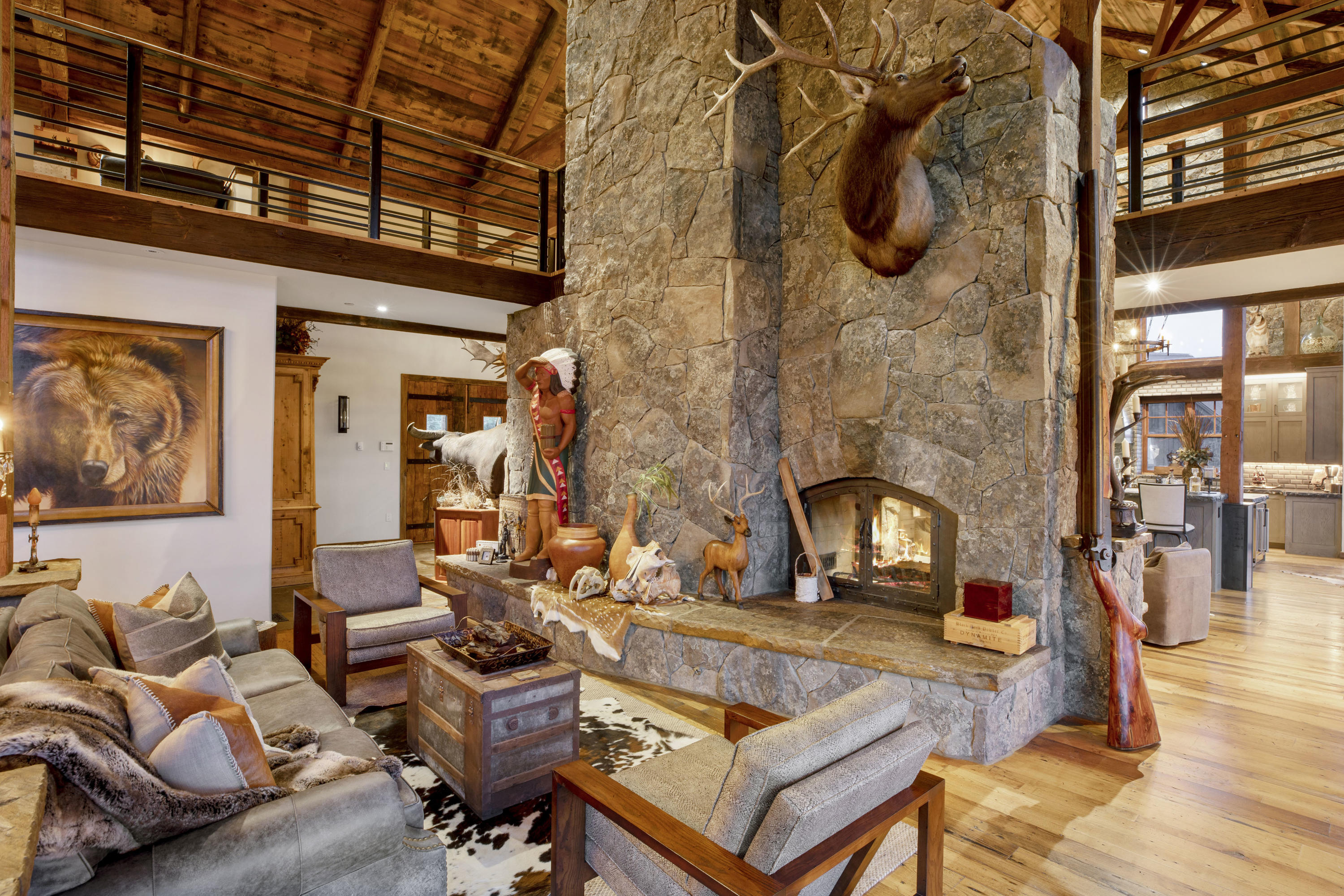 7039 Last Dollar Road Telluride, CO 81435 - Photo 13 of 52 a living room with furniture and a fireplace