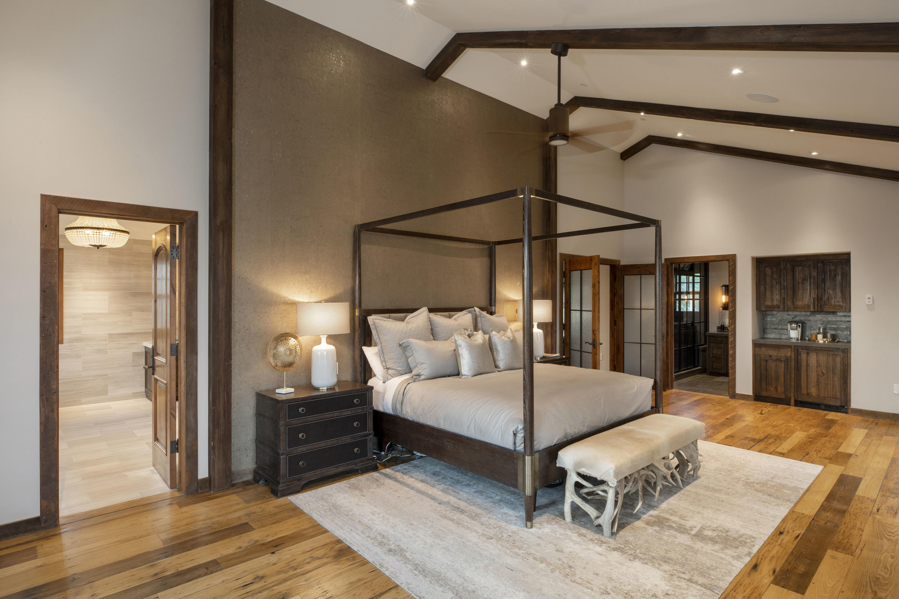 7039 Last Dollar Road Telluride, CO 81435 - Photo 18 of 52 a bedroom with a bed window and walk in closet