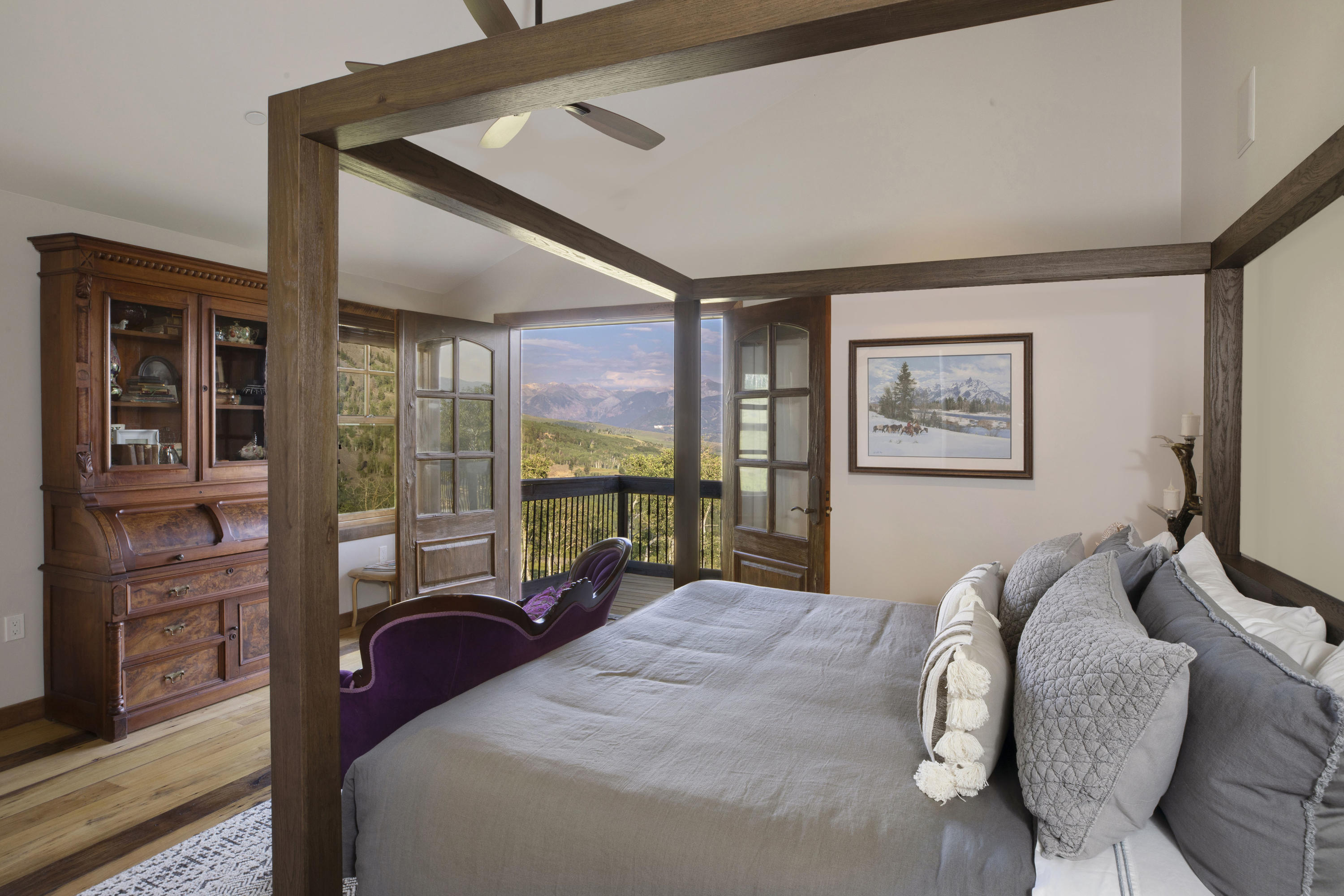 7039 Last Dollar Road Telluride, CO 81435 - Photo 22 of 52 a bedroom with a bed large window with the outer view