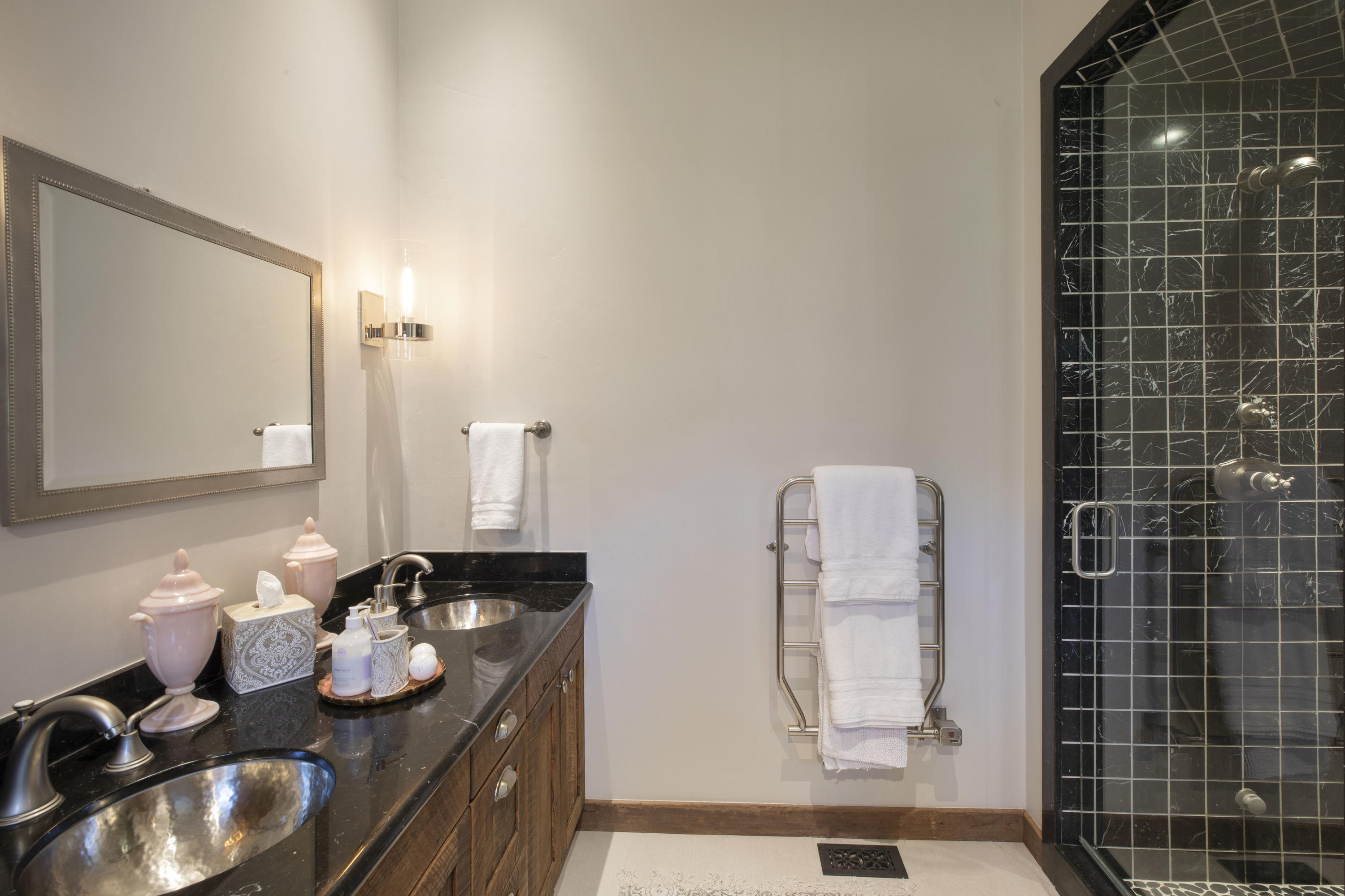 7039 Last Dollar Road Telluride, CO 81435 - Photo 25 of 52 a bathroom with a double vanity sink and a mirror