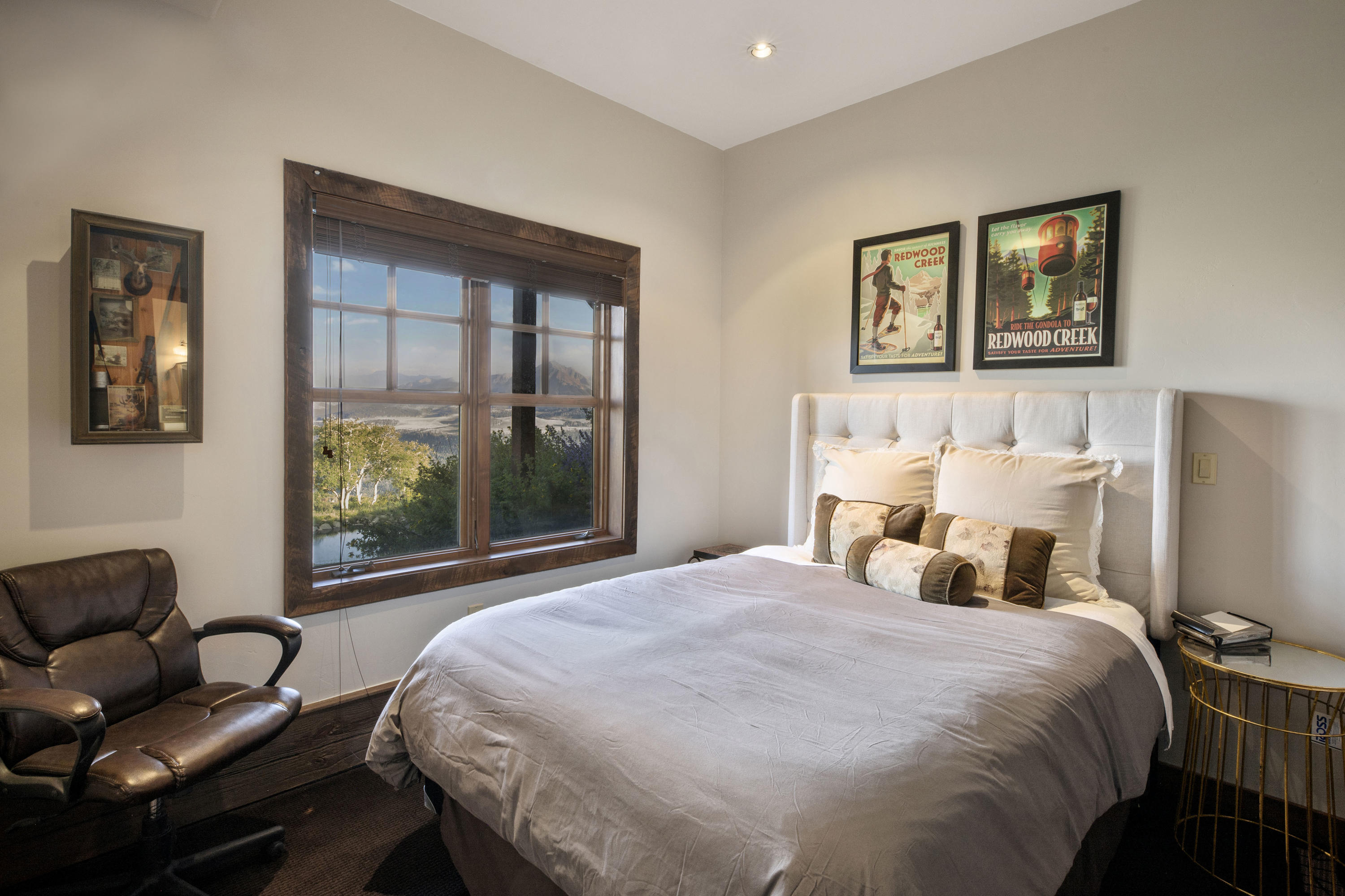 7039 Last Dollar Road Telluride, CO 81435 - Photo 31 of 52 a bedroom with a bed couch and window