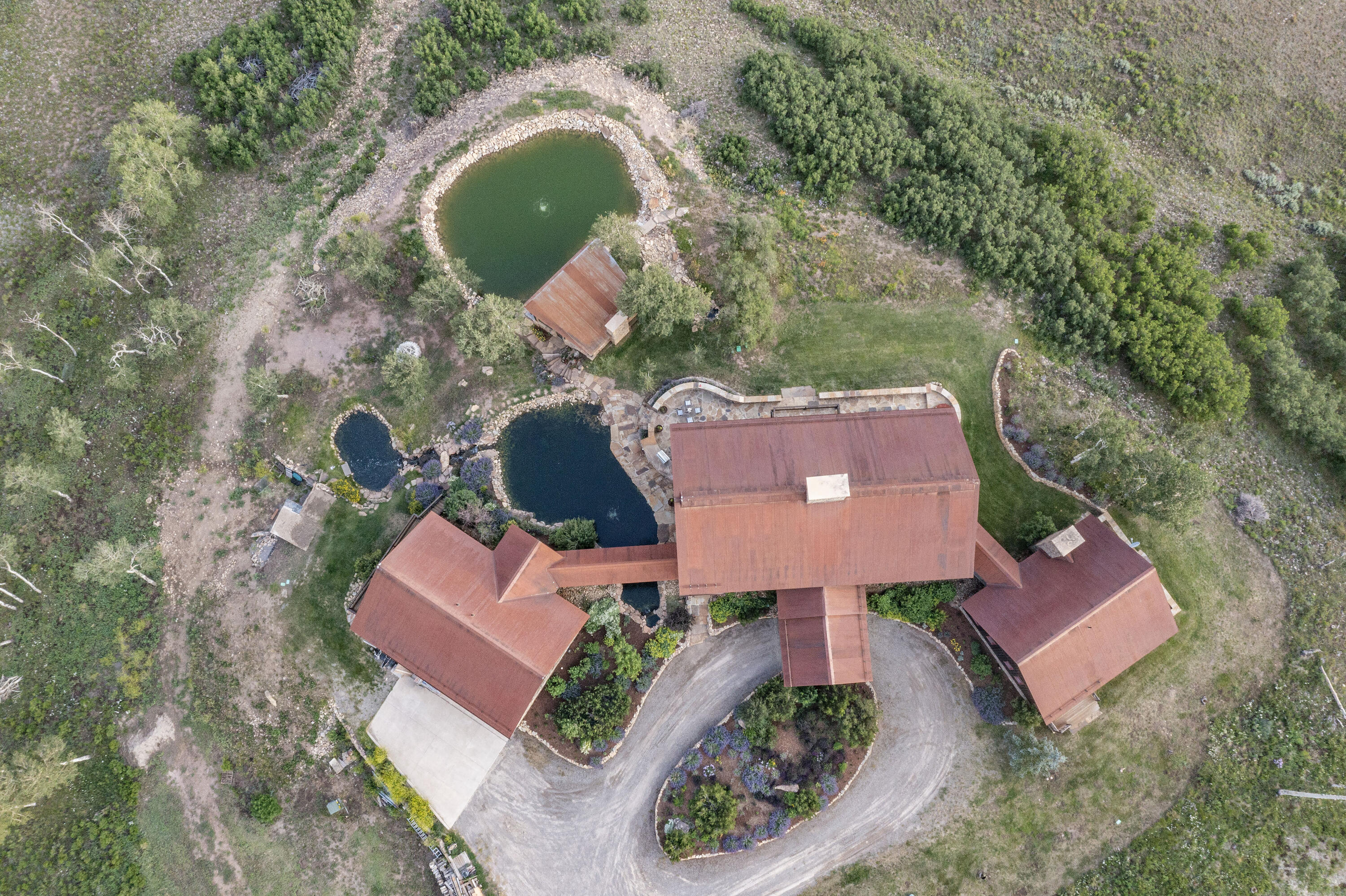 7039 Last Dollar Road Telluride, CO 81435 - Photo 41 of 52 an aerial view of a house with garden space and street view