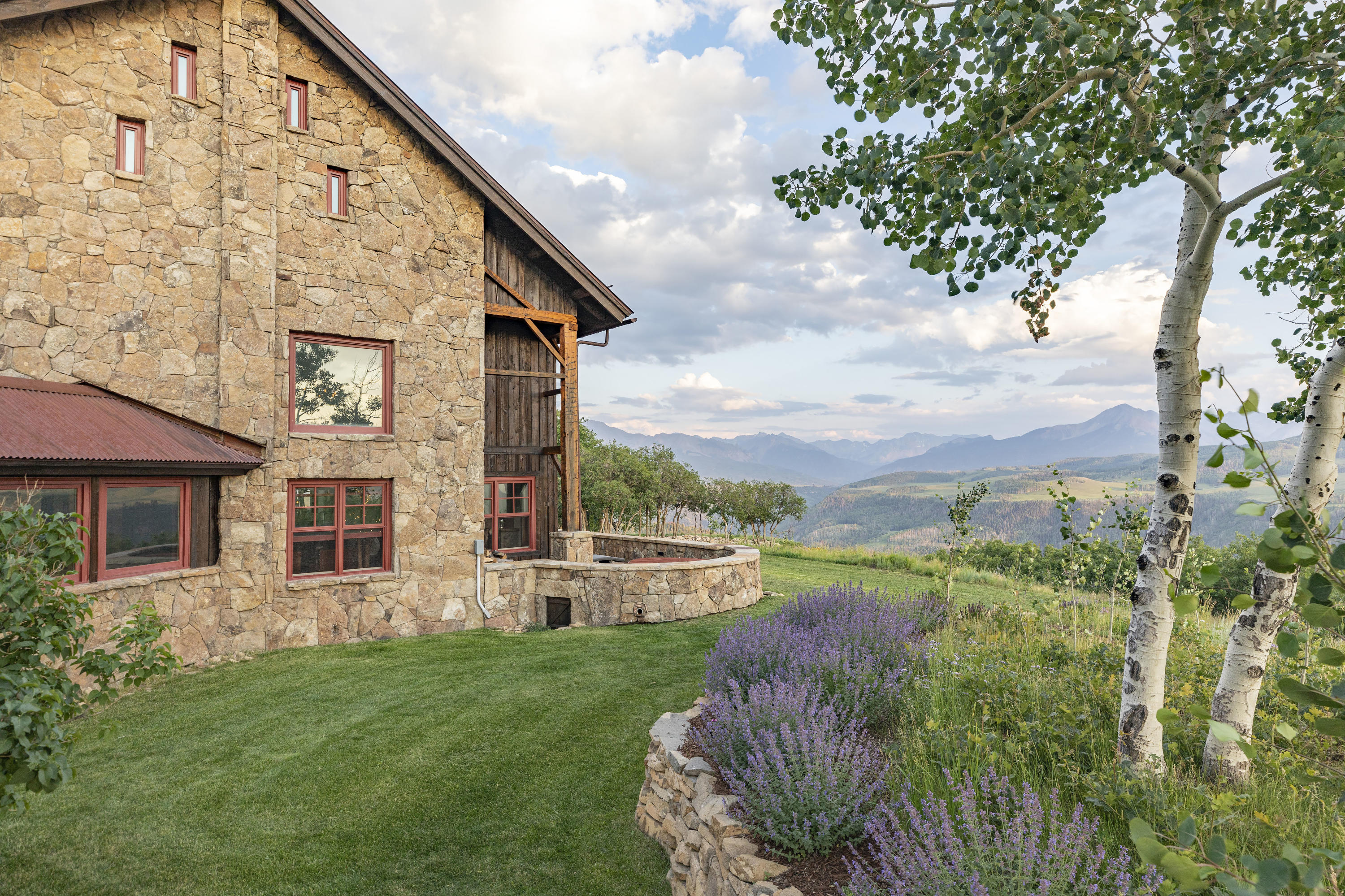 7039 Last Dollar Road Telluride, CO 81435 - Photo 42 of 52 a view of a house with a backyard