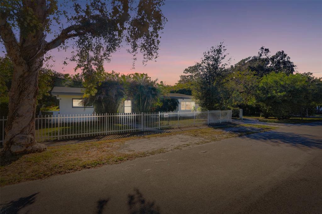 1050 Northeast 150th Street Miami, FL 33161 - Photo 49 of 50 a view of backyard and tree